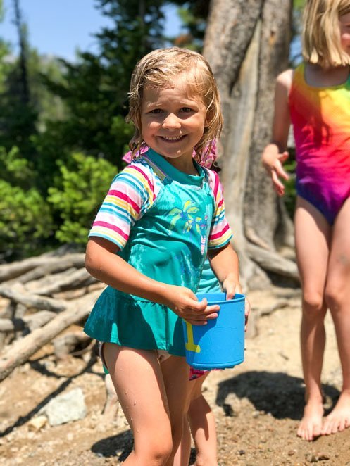 Girl swimming on String Lake in Grand Teton National Park