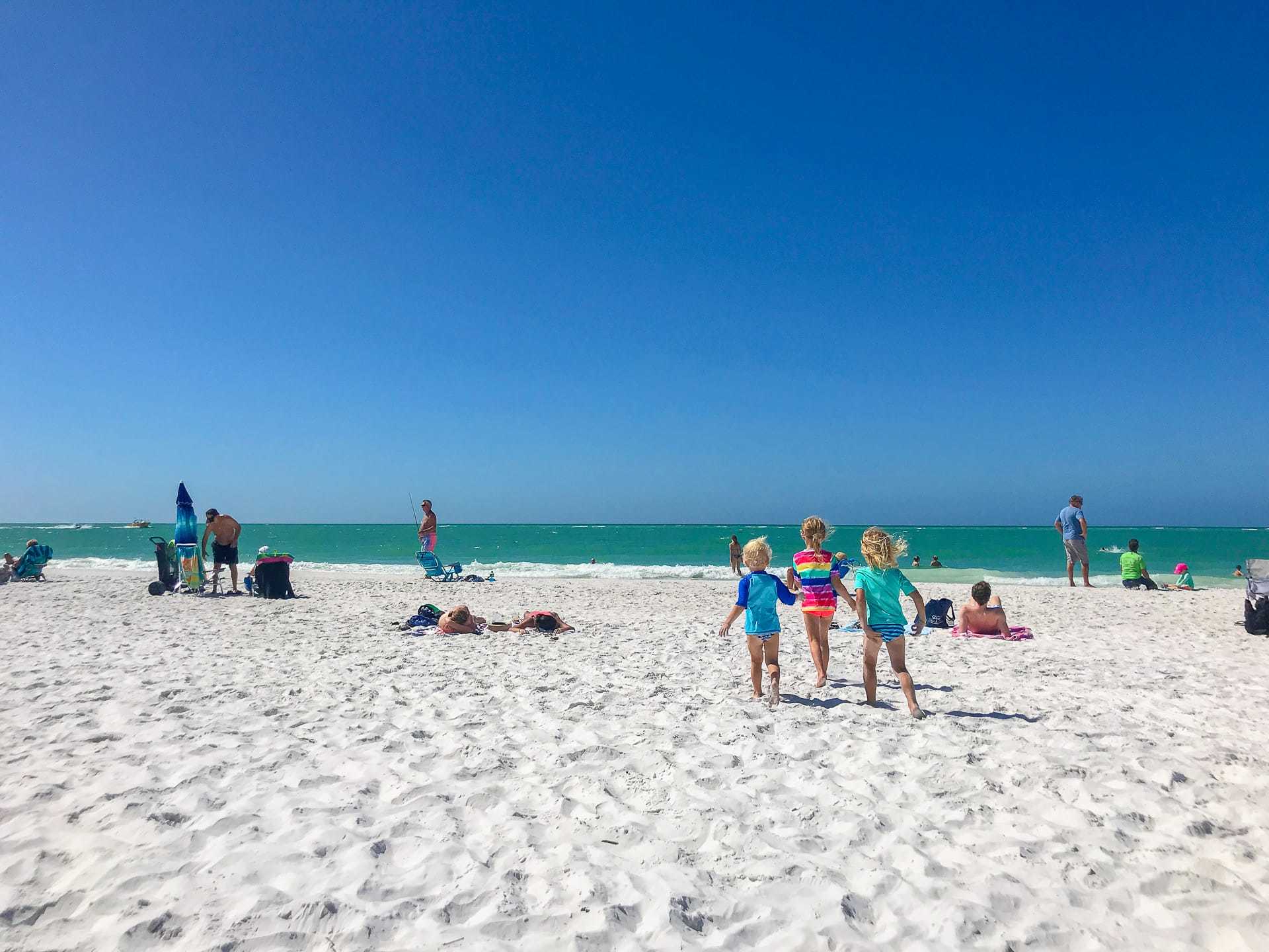 Let's Travel Family - Travel With Kids - Kids Running on the Beach