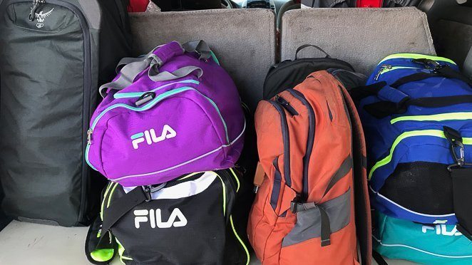 Traveling with a toddler on a plane, check bags!