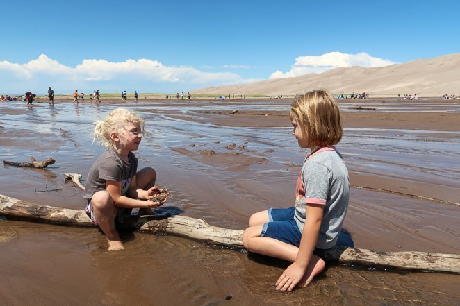 Play in the water at Great Sand Dunes