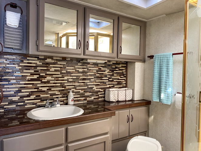 https://www.letstravelfamily.com/wp-content/uploads/2020/01/RV-bathroom-orgnaization-idea.jpg