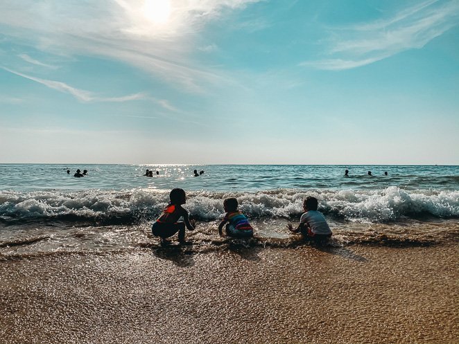 Beach play at sunset in Phuket