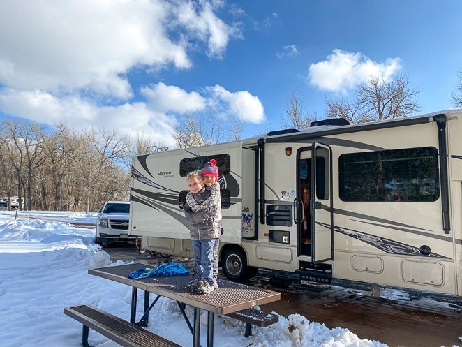 Wear gloves while living in a camper in the winter to stay warm