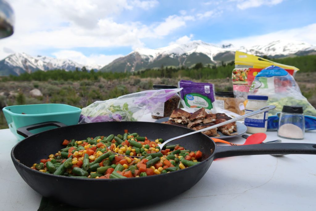 Cooking cast iron while camping